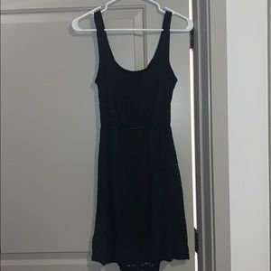 Black mini lace dress with open back detail